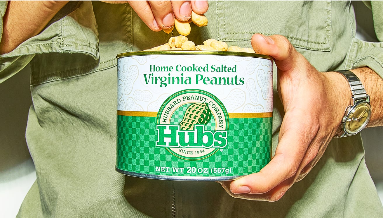 Peanuts falling around can of Hubs peanuts